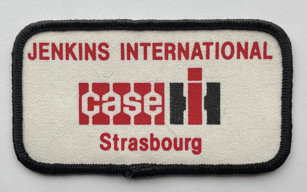 Jenkins International Strasbourg Red, Black and White Vintage Patch 4.2"x2.2" Image 1