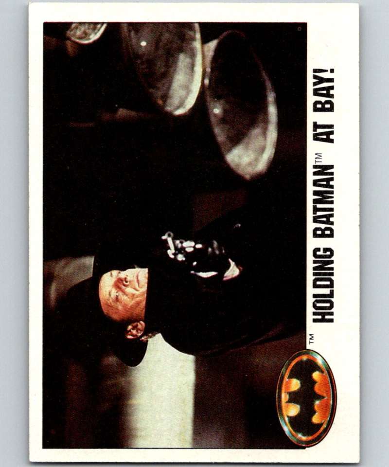 1989 Topps Batman #32 Holding Batman at Bay! Image 1