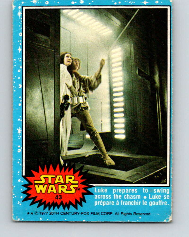 1977 OPC Star Wars #43 Luke prepares to swing across the chasm V33771