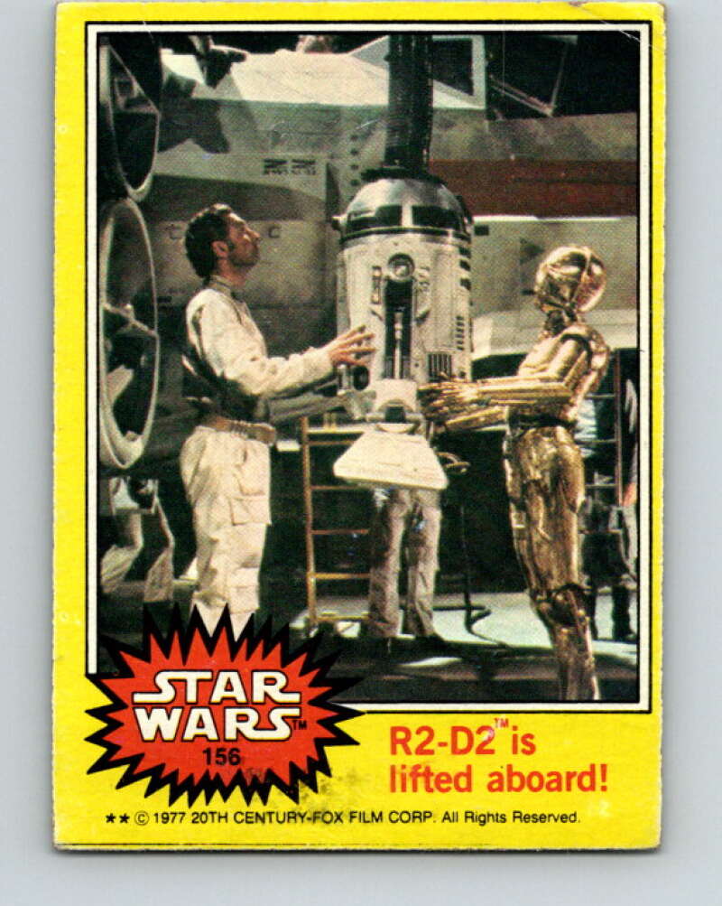 1977 Topps Star Wars #156 R2-D2 is lifted aboard! V34641