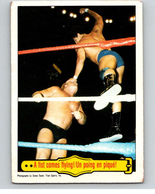 1985 O-Pee-Chee WWF #34 A Fist Comes Flying!   V65734 Image 1