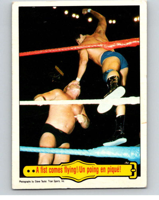 1985 O-Pee-Chee WWF #34 A Fist Comes Flying!   V65735 Image 1
