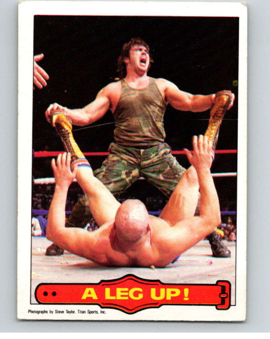 1985 O-Pee-Chee WWF Series 2 #20 A Leg Up!   V65837 Image 1