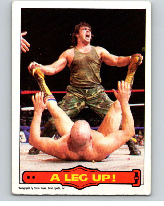 1985 O-Pee-Chee WWF Series 2 #20 A Leg Up!   V65838 Image 1