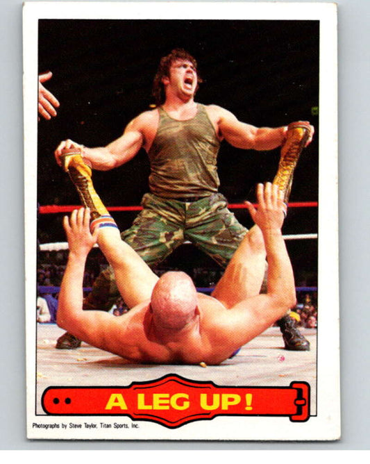 1985 O-Pee-Chee WWF Series 2 #20 A Leg Up!   V65839 Image 1