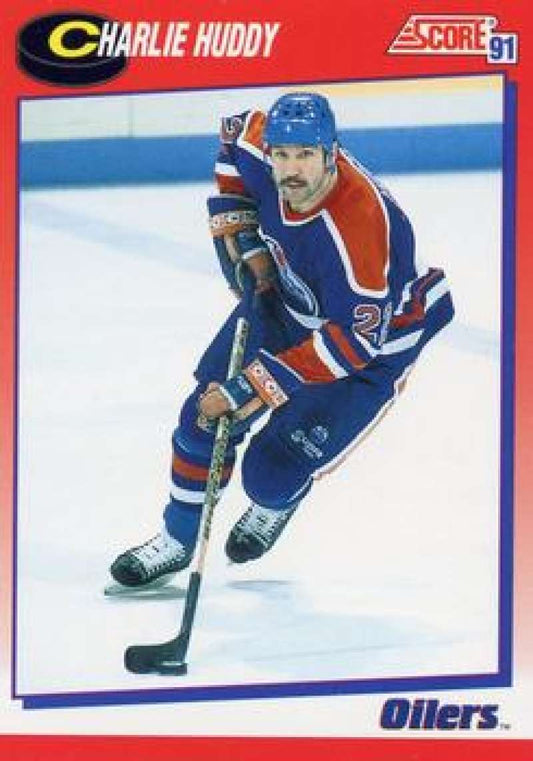 1991-92 Score Canadian Bilingual #247 Charlie Huddy  Edmonton Oilers  Image 1