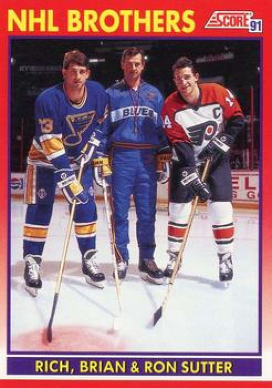 1991-92 Score Canadian Bilingual #268 Rich Sutter/Brian Sutter/Ron Sutter Blues  Image 1