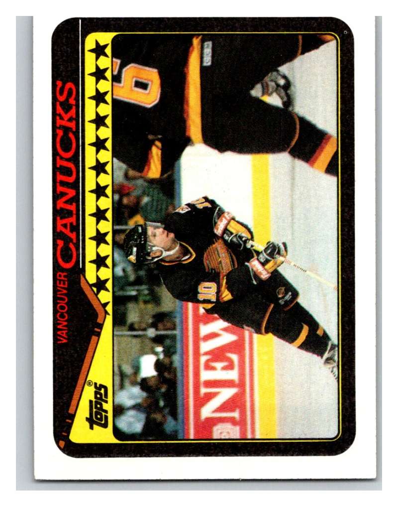 1990-91 Topps #59 Canucks Team Mint  Image 1