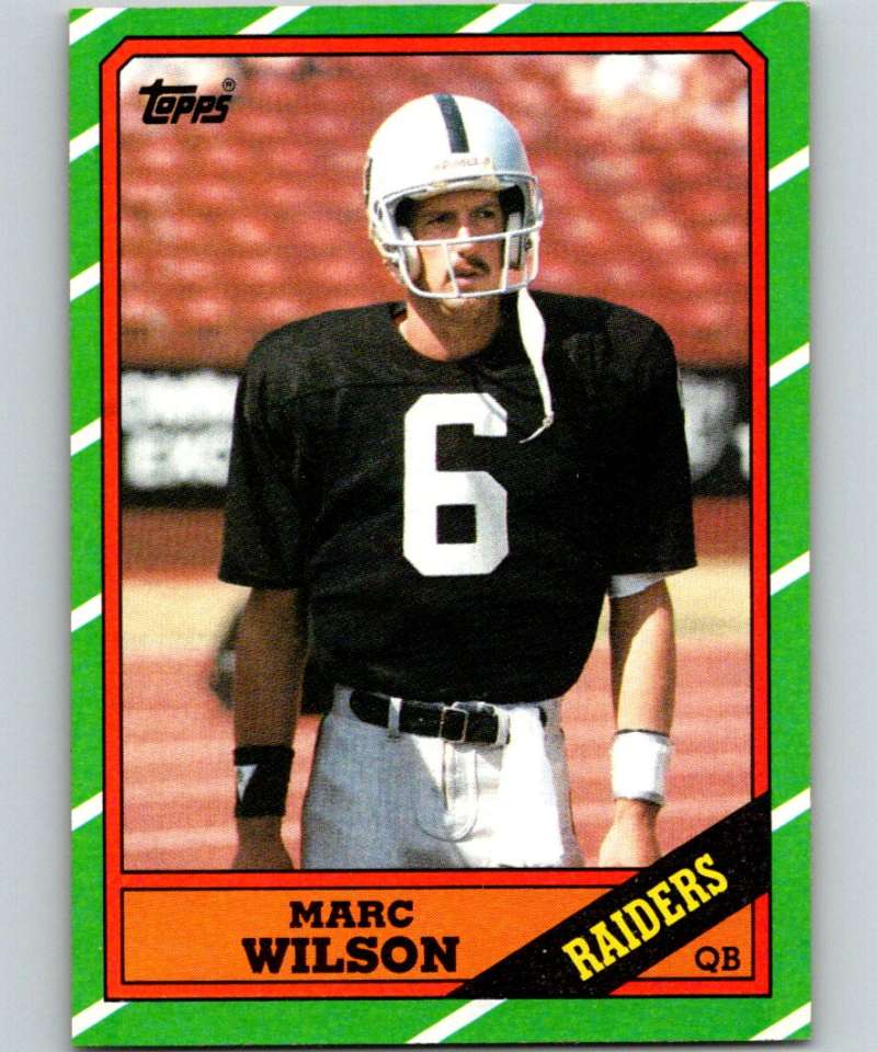 1986 Topps #61 Marc Wilson LA Raiders NFL Football Image 1