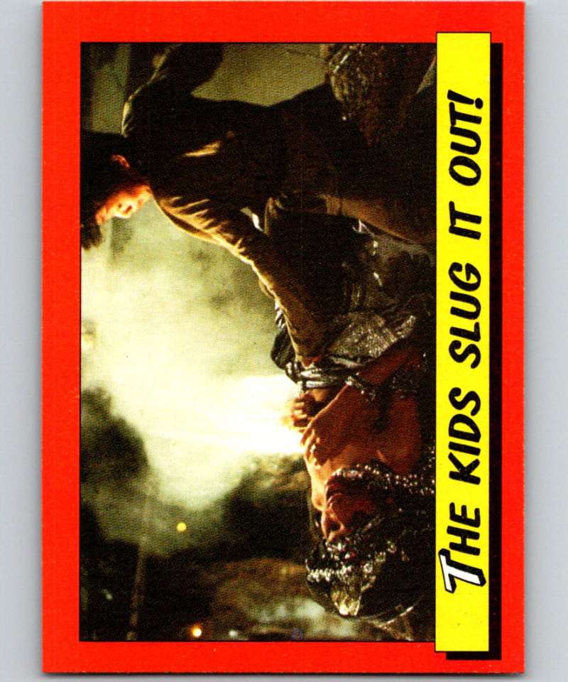 1984 Topps Indiana Jones and the Temple of Doom #65 The Kids Slug it Out! Image 1