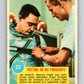 1963 Topps Astronauts #23 Putting On His Parachute V10138