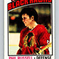 1976-77 O-Pee-Chee #31 Phil Russell  Chicago Blackhawks  V11958