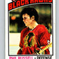 1976-77 O-Pee-Chee #31 Phil Russell  Chicago Blackhawks  V11959