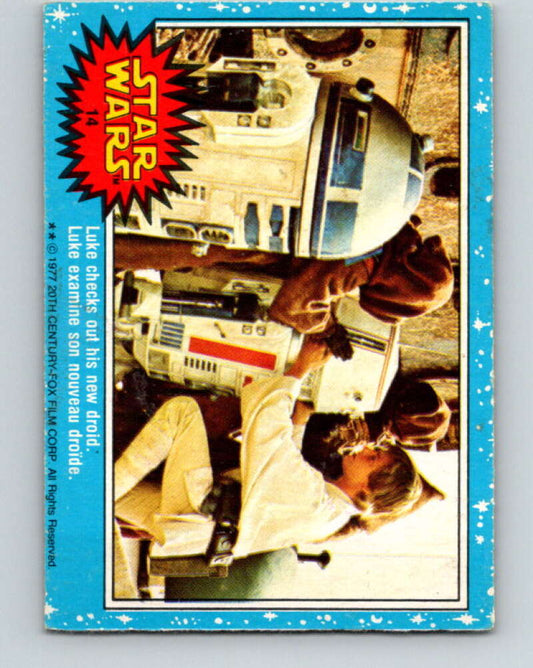 1977 OPC Star Wars #14 Luke checks out his new droid   V33597