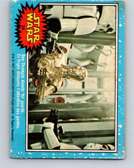 1977 OPC Star Wars #34 See-Threepio diverts the guards   V33714