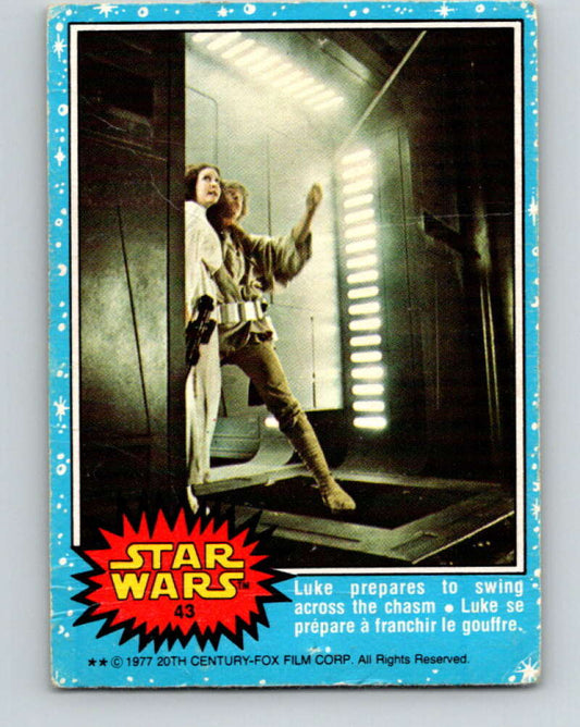 1977 OPC Star Wars #43 Luke prepares to swing across the chasm   V33772