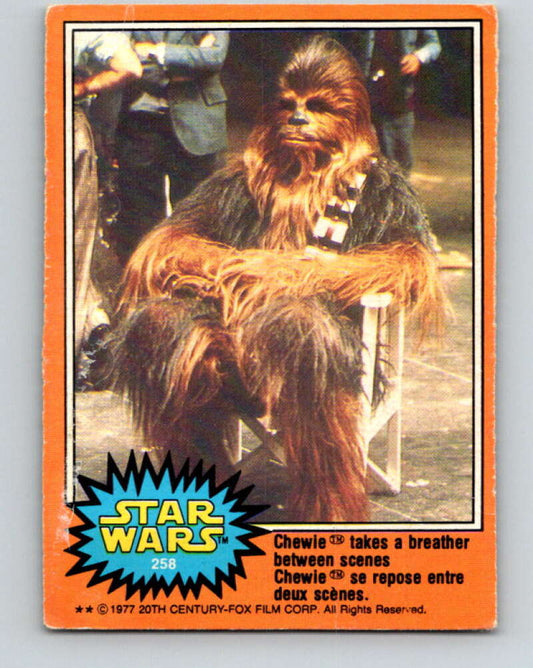 1977 OPC Star Wars #258 Chewie takes a breather between scenes   V34595