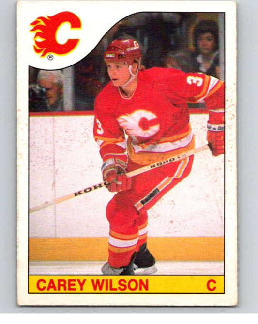 1985-86 O-Pee-Chee #191 Carey Wilson  RC Rookie Calgary Flames  V56784 Image 1