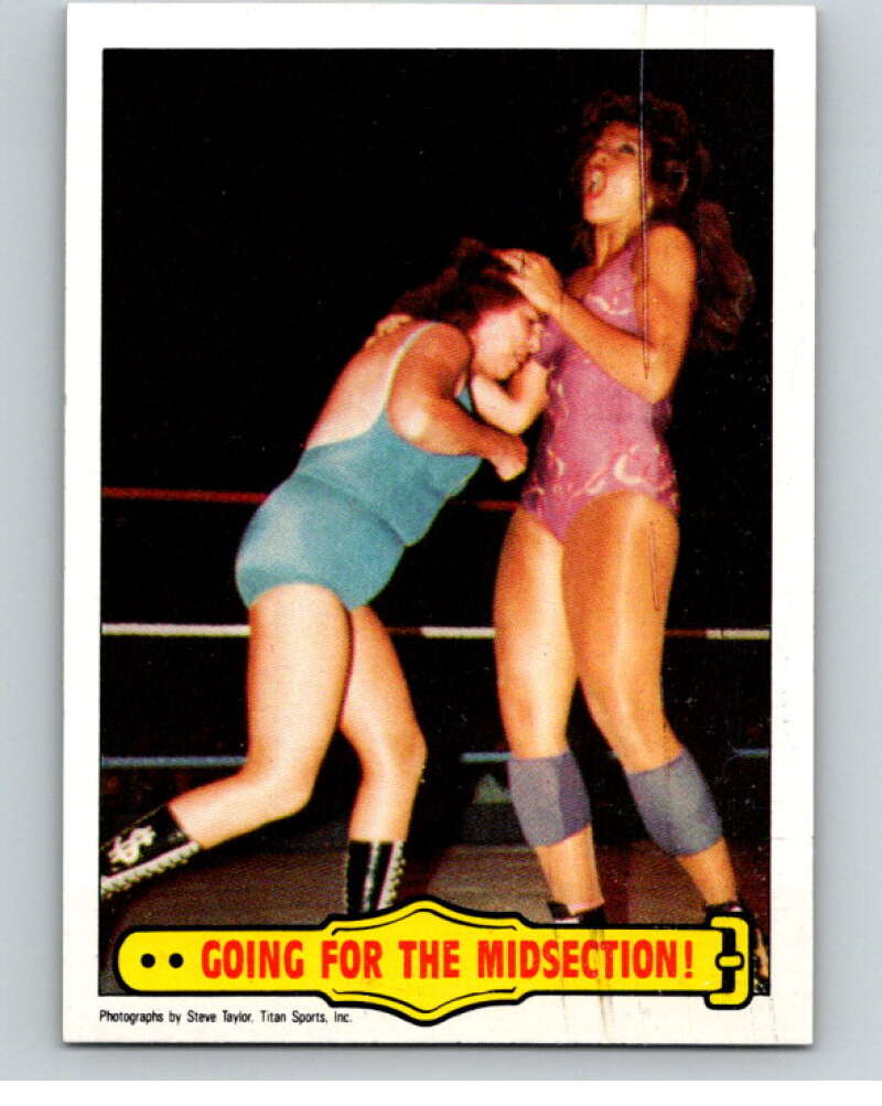1985 Topps WWF #25 Going For The Midsection!   V65664 Image 1