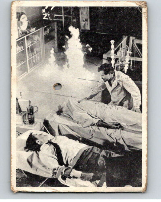 1965 Topps Man From Uncle #37 Scientist and two bodies..  V68694 Image 1