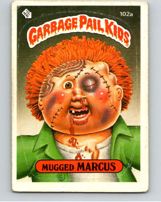 1986 Topps Garbage Pail Kids Series 3 #102a Mugged Marcus   V73001 Image 1